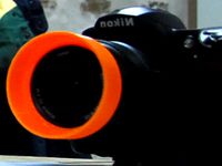 Nikon AF-S Nikkor 18-55 mm lens hood by deltapenguin