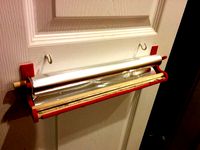 Material Roll Holder with Cutter for Convenient Mounting by g0at