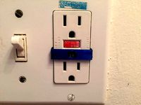 GFCI Protected Outlet Test Button Guard by jdacal