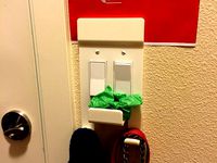 Light switch plate with hooks by Ultrablond