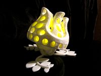 The down flower - a second object of " rotating flowers - a small lights collection " by gianfranco