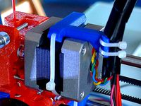 Stepper mounted extruder cable harness strain relief by AndrewBCN