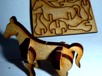 Tiny, lasercut horse by Yngel