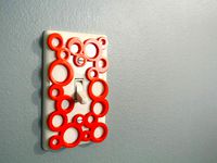 Decorative switch-plate by Tosh