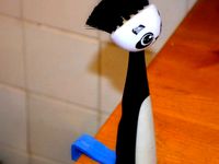 Holder for dish-washing brush. by tse