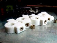 Printrbot y-bar ends with flower nuts. by eddiema