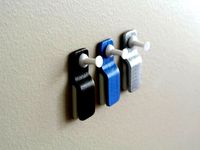Wall mount paper clip by Tosh
