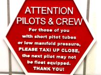 Aircrew Urinal Attention Sign by Tiebie