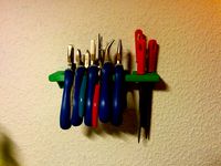 Pliers & file holder by vindolin