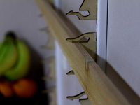 Laser-cut brackets for wall mounting pretty much anything by Jarrett