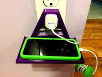 WALL OUTLET CELLPHONE HOLDER (IPHONE & IPOD) - Remix by wire10ga