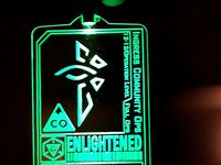 Ingress laser-cut faction badges by 3d0g