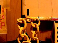 another ceramic chain experiment with tripod by tomburtonwood