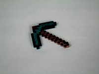 8-bit Minecraft fridge magnet by GhostBoy