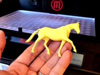 3D-printed toy horse figure (two halves) by CreativeTools
