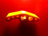 Holey coin-op bottle opener by mathgrrl