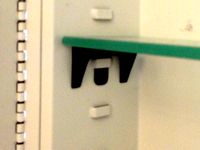 Shelf holder for old medicine cabinet by ivymike
