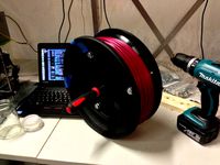 Spool for coiled filament that can mount on a rod by Bracken