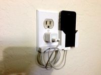 Wall Outlet Plate Smartphone dock by rubb3rtoe
