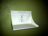 SMALL SHELF FOR USE AROUND A PLUG by CLARKTRANS