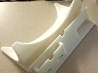 Dual iPad 3 and iPhone 4S charging stand with speaker amplifier.  by skysurferbum