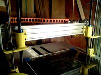 Floating X carriage mount for Trinity Labs Aluminatus 1. De-couples Z axis lift from X-Y variance by kenaaker