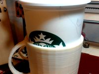 Disposable coffee cup holder by drmatrix