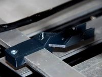 Aluminatus Trinity One Heated bed wire support by Steamerzone