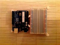 Arduino uno + half size breadboard holder by Jigsawnz