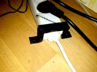 Extension cord mounting brace by MarcusWolschon