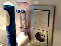 Holder for electric toothbrush by thingfisch