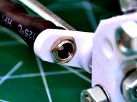 Clip-on Huxley power connector bracket by Physics_Dude