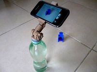Universal bottle cap tripod by Camos