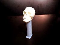 Skull with Pointy Teeth PEZ Dispenser Topper by akaziuna