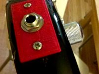 Bass guitar plug holder by mweinberg