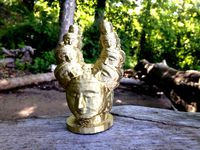 Horned Buddha by hirmes