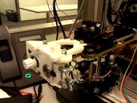 Mendel X-bracket extruder mount by Scrambler