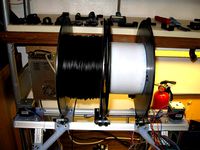 Clip on spool mount for mendelmax by Simonious