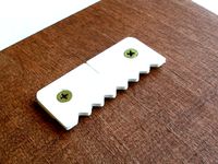 Handy Picture Hanger by Geotek