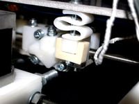 Reprap Mendel Bed Spring Nut Captivator by DanielJABailey