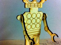 Wooden Lasercut Robot by andyleer
