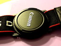 Camera Lens Cap Holder by kitlaan