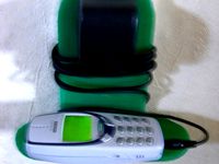 Parametric Cell Phone Charger Holder by rhmorrison