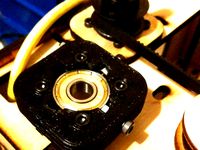 Locking Bearing Bracket for Makerbot Cupcake by clothbot
