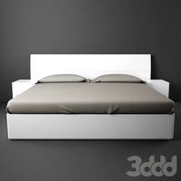 Bed with side table