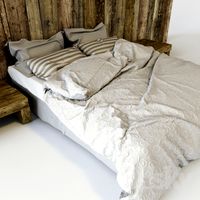 Bed with etnic headboard and tables