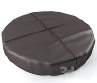 Leather pouf.