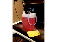 Mount holder for methanol hand pump on plastic can. by SilverHart