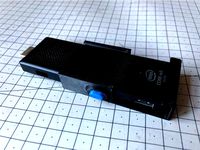 Intel compute stick holder with side button [with Fusion 360 source] by gportelli
