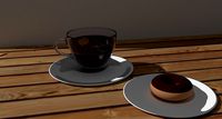 A Nice delicious Donut and a Cup of Tea